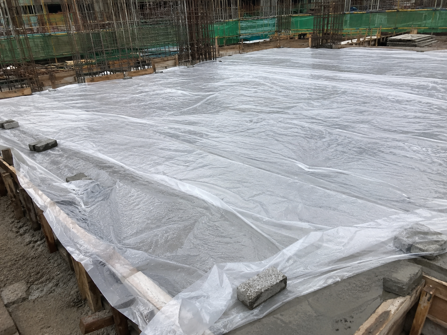 Construction plastic sheeting for moisture barrier